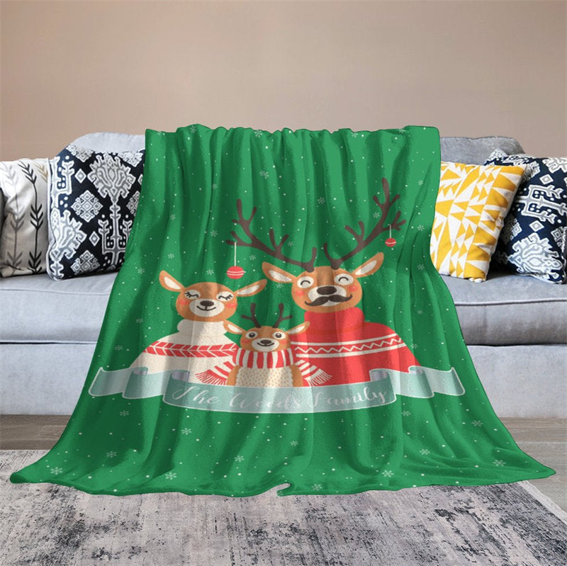 https://www.lofarisbackdrop.com/cdn/shop/files/customize-elk-family-snowy-green-blanket-with-name-custom-made-free-shipping-103.jpg?v=1696934300